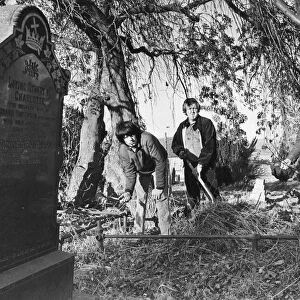 l to r, Malcolm Storey, George McCreedy and Ian Storey clean up the cemetery at Prudhoe