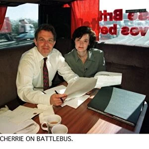 Labour leader Tony Blair with his wife Cherie on the Labour Partys battle bus. April 1997