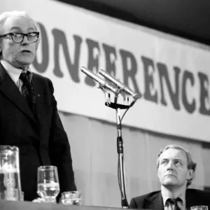 Labour politician and Secretary of State for Employment Michael Foot watched by Tony Benn