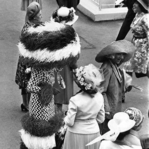 Ladies day at Royal Ascot. Mrs Gertrude Shilling stands out in feathers