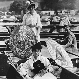 Two ladies at the Henley Regatta in 1914 Two women modelling clothes wearing
