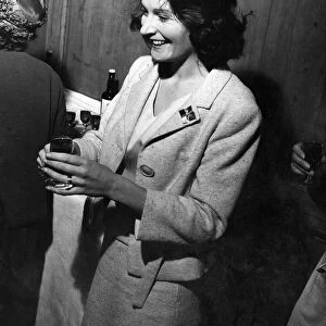 Lady Astor handing out sherry at a conference of British Organisations for aid to