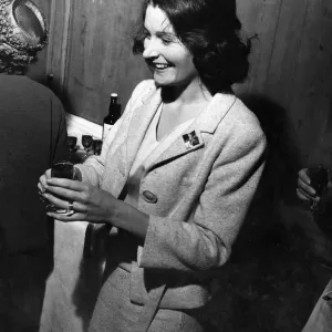 Lady Astor handing out sherry at a conference of British Organisations for aid to
