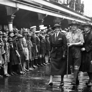 Lady Baden Powell inspects the Guard of Honour before departing with the Chief Scout Lady Baden Powell inspects the Guard of Honour before departing with the Chief Scout