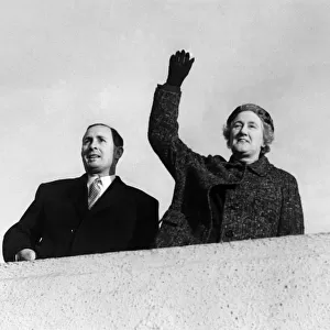 Lady Dorothy Macmillan, wife of the Prime Minister, waves as the comet with the Prime