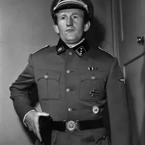 Lance Percival wearing his SS. costume for the part he will play in Lance Percival wearing his SS. costume for the part he will play in