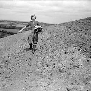 Landgirl sowing by the old fashioned Fiddle method Farming Women fulfilling