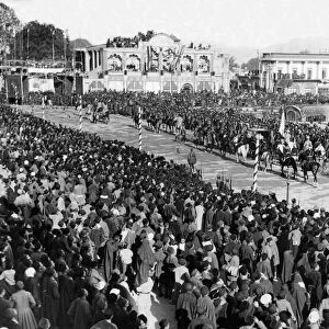 Large crowds gather to watch royal procession after coronation of Reza Shah Pahlevi