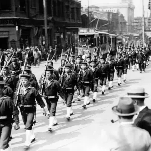 A large force of Japanese sailors marching from their ship through the streets of A large force of Japanese sailors marching from their ship through the streets of