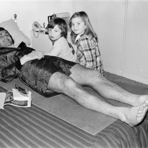 Larry Lloyd Coventry City football player lying on bed at home as he recuperates Larry Lloyd Coventry City football player lying on bed at home as he recuperates