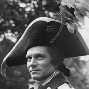 Laurence Olivier in costume on set during filming of The Devils Disciple - July 1958 Laurence Olivier in costume on set during filming of The Devils Disciple - July 1958