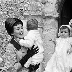 Laurence Olivier and Joan Plowright attend the Christening of their daughter Tamsin