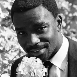 Laurie Cunningham poses for the camera with a flower Madrid Spain Laurie Cunningham poses for the camera with a flower Madrid Spain