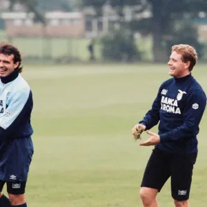 Lazio footballer Paul Gascoigne with teammate Roberto Cravero during a team training