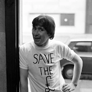 Lead singer of the Troggs pop group, Reg Presley wearing the T-shirts on Oxford St