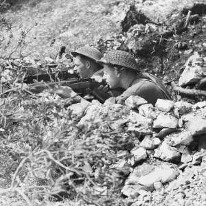 Leading Aircraftman J. Morris and Sgt. E. Hook, part of an R. A. F. regiment in Italy Leading Aircraftman J. Morris and Sgt. E. Hook, part of an R. A. F. regiment in Italy