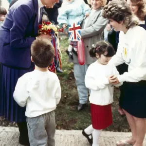 Leanne Venison finds it a little to much to present a posy to Princess Diana during her