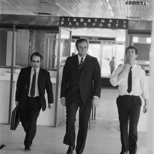 Leeds United manager Don Revie goes through passport control in Greece as the team return