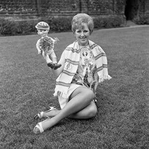 Leeds United secretary Janet Rossidale with rosettes of all the teams beaten that season