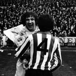 Leeds v. Southampton. Leeds United player Norman Hunter receives a bunch of flowers Leeds v. Southampton. Leeds United player Norman Hunter receives a bunch of flowers