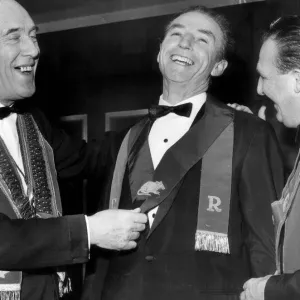 Left, Comedian and football club chairman, Tommy Trinder puts the honour sash around Left, Comedian and football club chairman, Tommy Trinder puts the honour sash around
