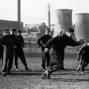 Leicester City football team pictured in a dribbling race during a training session held