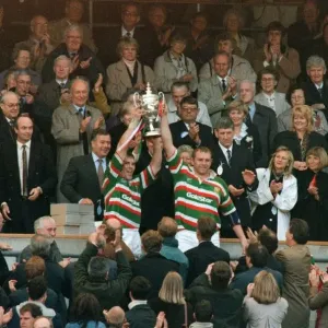 Leicesters Dean Richards holds up the Pilkington Trophy at Twickenham May 10
