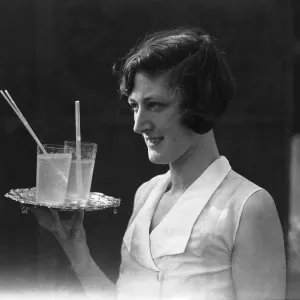 Anyone for lemonade, A mannequin seen here modelling the latest 1932 summer fashions