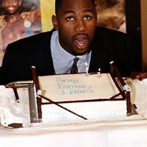 Lennox Lewis Boxer with his Birthday cake during a press conference for the upcoming