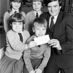 Lepton C of E Church school pupils present cheque for 127 to RNIB appeals organiser Lepton C of E Church school pupils present cheque for 127 to RNIB appeals organiser