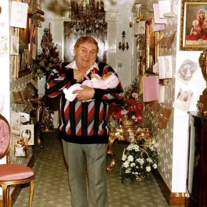 Les Dawson comedian with his baby daughter Charlotte at home A&copy;Mirrorpix