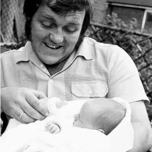 Les Dawson Holding a baby dbase msi