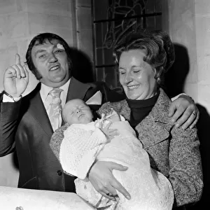 Les Dawson and his wife Margaret at the christening of their baby daughter Pamela Jane at