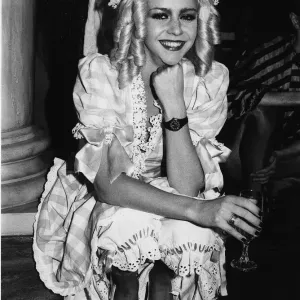 Leslie Ash Actress dressed in costume of nursery rhyme character Little Miss Muffet takes