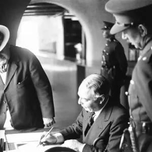 Leslie Hore-Belisha Secretary of State for War seen here signing the visitors book during Leslie Hore-Belisha Secretary of State for War seen here signing the visitors book during