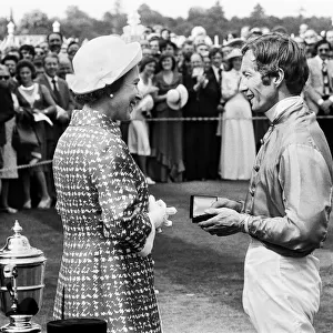 Lester Piggott with Queen Elizabeth after winning the King George VI