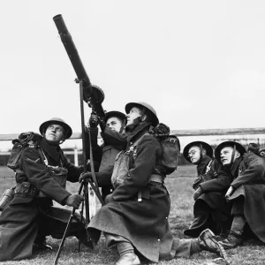 Print of a Lewis gun crew in action during Anti-Aircraft exercises