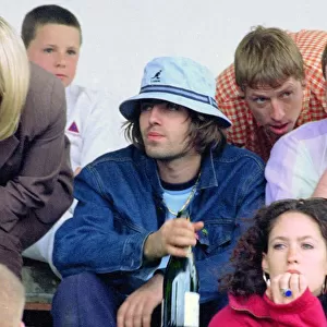 Liam Gallagher drinking wine - May 1996 Oasis v Blur football match Played at