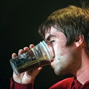 Liam Gallagher Oasis pop group December 1997 Drining beer from glass SECC Glasgow