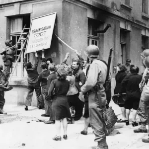 Print of American troops in Cherbourg, Northern France, 26th June 1944 Print of American troops in Cherbourg, Northern France, 26th June 1944