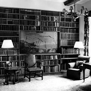 The library at Chartwell House. Inset in the bookcase is a model of the Mulberry