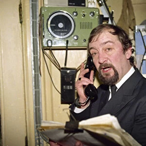 Lighthouse keeper Colin Jones seen here radioing in a weather report during this last