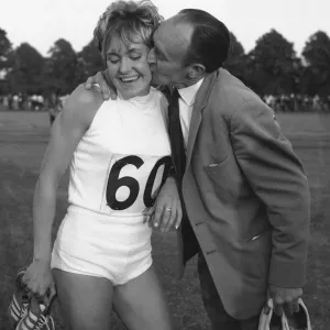 Lillian Board after breaking her own 880 yard track record at Reading gets a kiss Lillian Board after breaking her own 880 yard track record at Reading gets a kiss