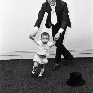 Lionel Blair giving dancing tuition to his 10-month-old son Daniel. 23rd June 1969 Lionel Blair giving dancing tuition to his 10-month-old son Daniel. 23rd June 1969