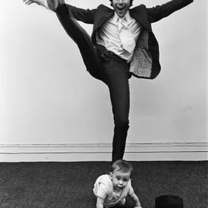 Lionel Blair giving dancing tuition to his 10-month-old son Daniel. 23rd June 1969 Lionel Blair giving dancing tuition to his 10-month-old son Daniel. 23rd June 1969