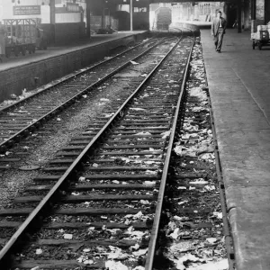 Litter on the tracks at New Street Station, Birmingham, West Midlands. 31st August 1955 Litter on the tracks at New Street Station, Birmingham, West Midlands. 31st August 1955