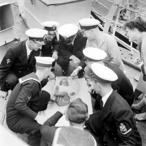 Little baby girl on board the Cruiser HMS Cambria in Devonport August 1952