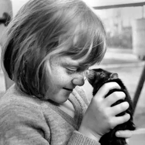 Little girl holding a rat. November 1969 Z10521-003 Little girl holding a rat. November 1969 Z10521-003