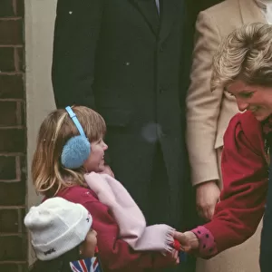 A little girl meets The Princess. Princess Diana meets and greets the people of Walsall