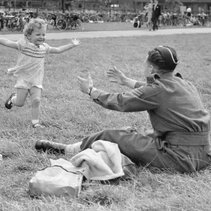 Little girl and soldier. August 1941
